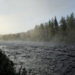 Morning fog on the river next to the campsite Idre Sweden